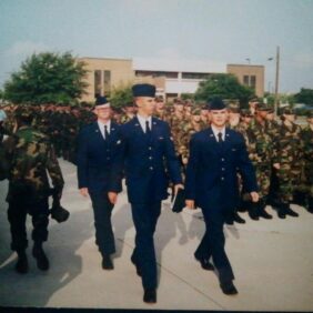 Air Force Airman walking in formation. Nathan Ellingson in back row