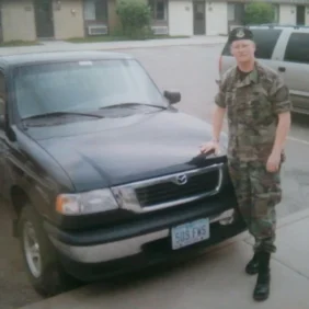 Nathan Ellingson standing by his truck at Malmstrom AFB