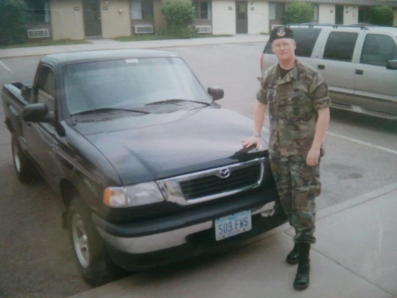 Nathan Ellingson standing by his truck at Malmstrom AFB
