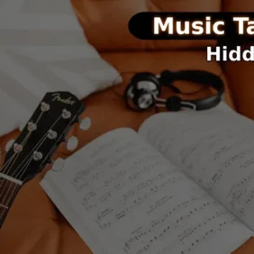 Fender guitar, headphones and sheet music on a leather sofa — Music Talk with Nate Hidden Gems